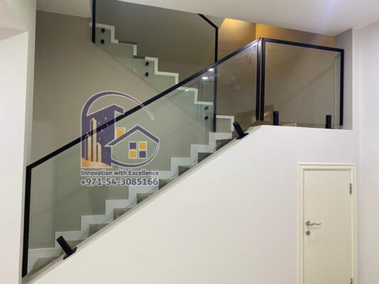 black frame staircase glass installation in dubai